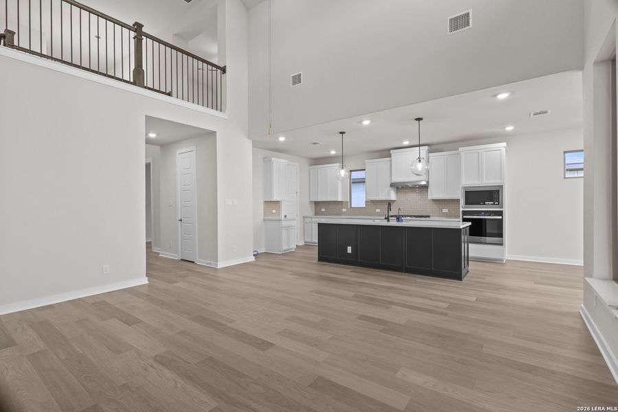 Furnished interior view inside a new home in Nopal Valley, San Antonio (Image 14).