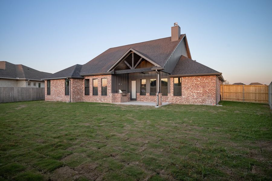 Exterior details and patio area of a home in Greens Prairie Reserve, College Station (Image 3).