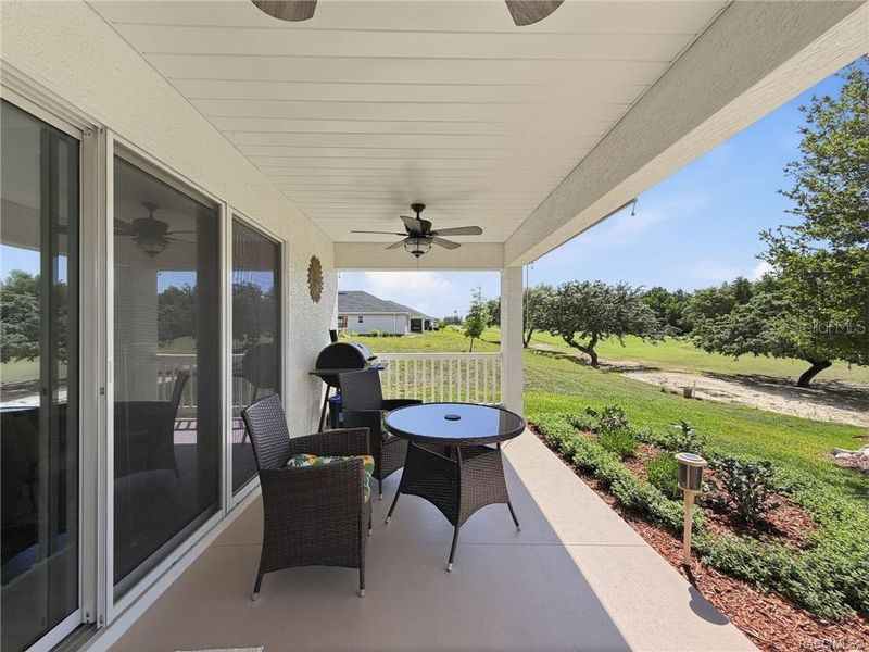 Exterior details and patio area of a home in The Fairways At Twisted Oaks, Beverly Hills (Image 26).