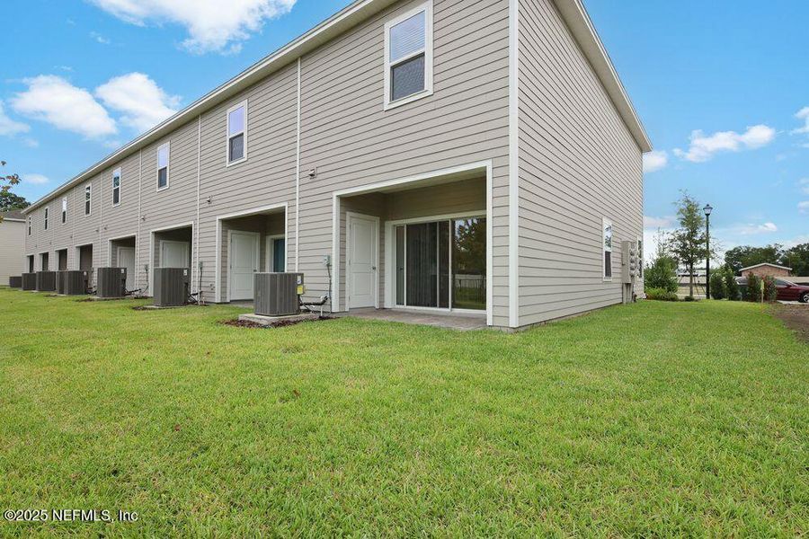 Front exterior of a new home in Sabal Terrace, Jacksonville, FL, highlighting curb appeal (Image 18).