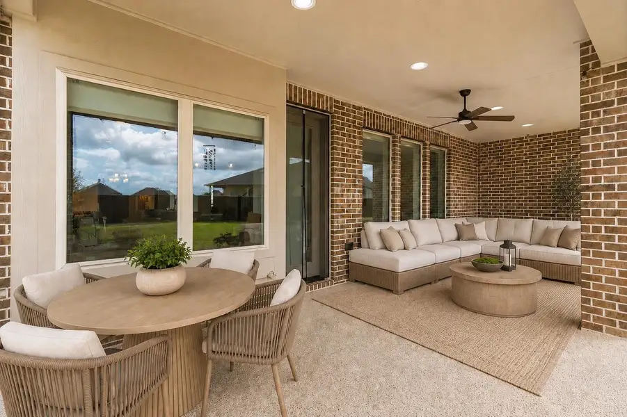 Sit back, relax and enjoy your gorgeous backyard while sitting under your covered patio! *This photo has been virtually staged.