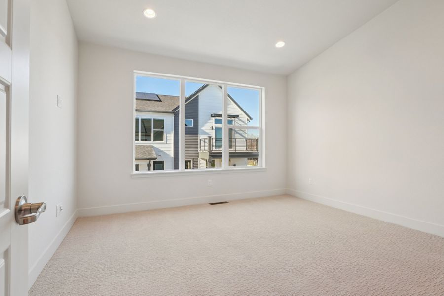 Spacious, unfurnished interior of a new home in Loretto Heights - Rise Collection, Denver (Image 15).