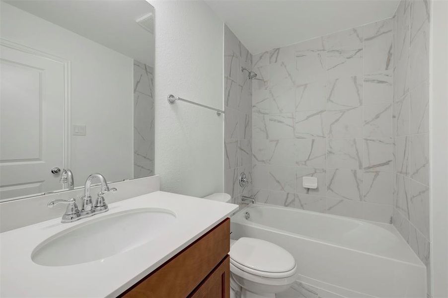 Furnished interior view inside a new home in Lily Creek at Sutton Fields, Aubrey (Image 14).