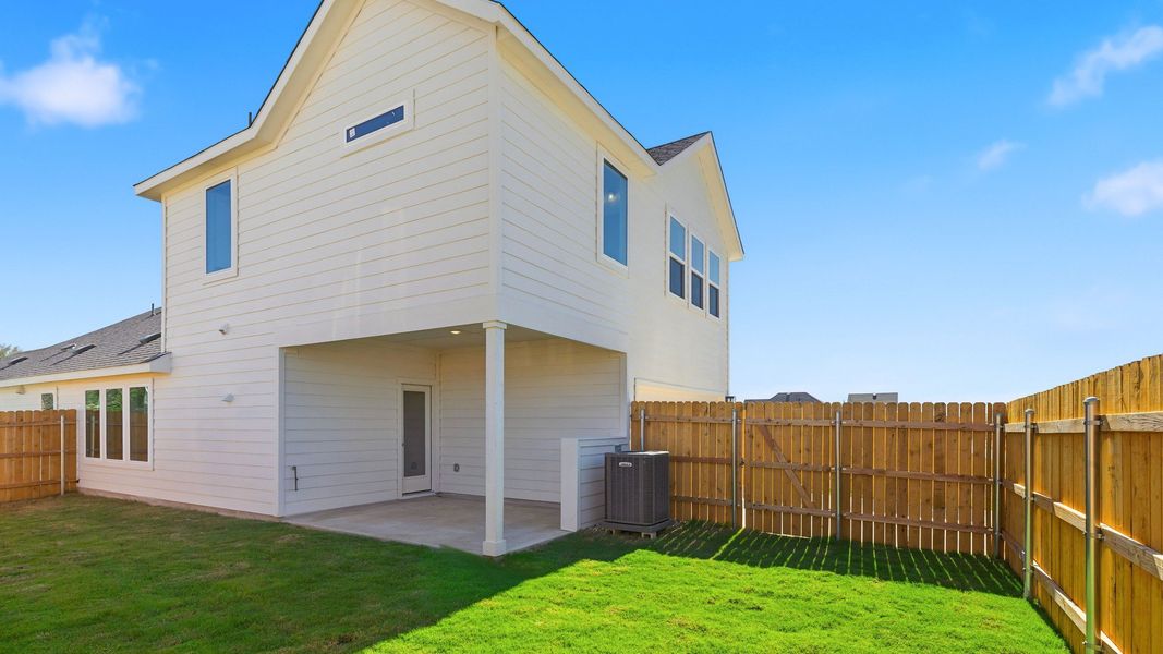 Exterior details and patio area of a home in Creeks Crossing, Elgin (Image 3).