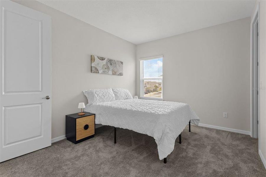 Furnished interior view inside a new home in River Landing, Wesley Chapel (Image 32).