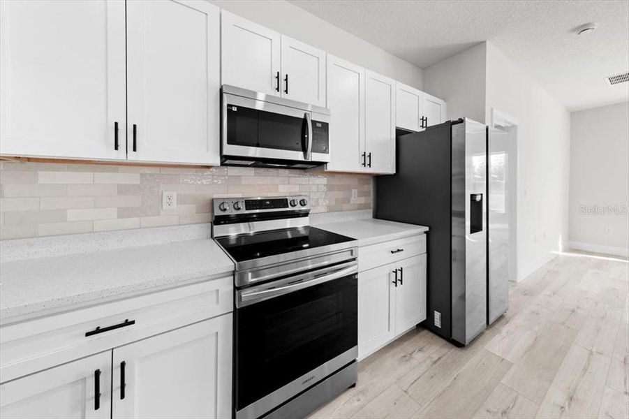 Furnished interior view inside a new home in , Ocala (Image 13).