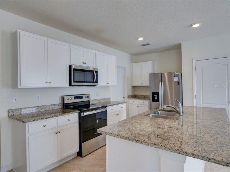 Furnished interior view inside a new home in Cascades, Davenport (Image 7). Furnished interior view inside a new home in Cascades, Davenport (Image 7).
