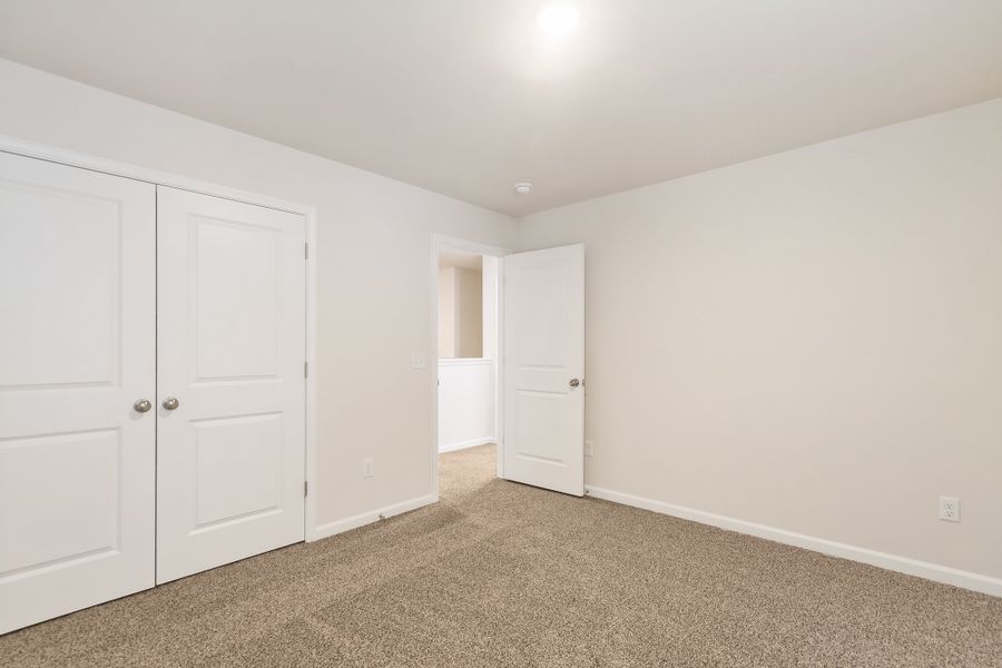 Spacious, unfurnished interior of a new home in The Grove, Florence (Image 40).