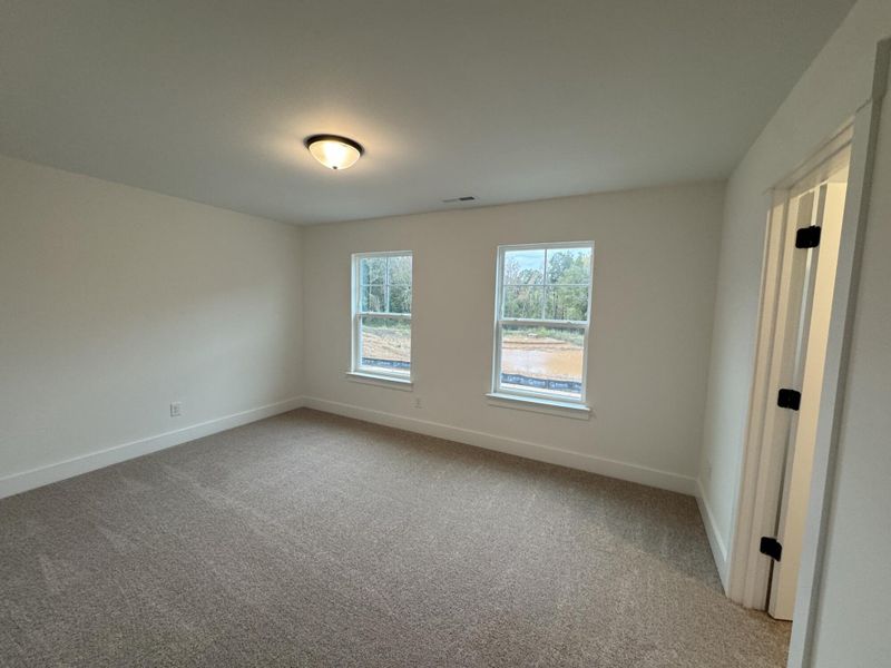 Spacious, unfurnished interior of a new home in Carrington, Stanley (Image 23).