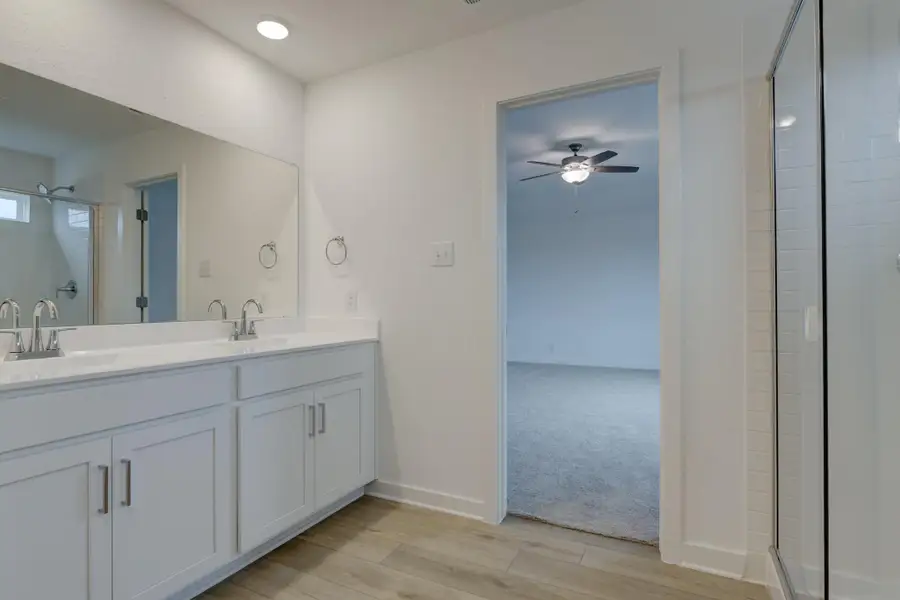 Representative furnished interior of a home built from the Alexis by Ashton Woods in Nopal Valley, San Antonio (Image 11).