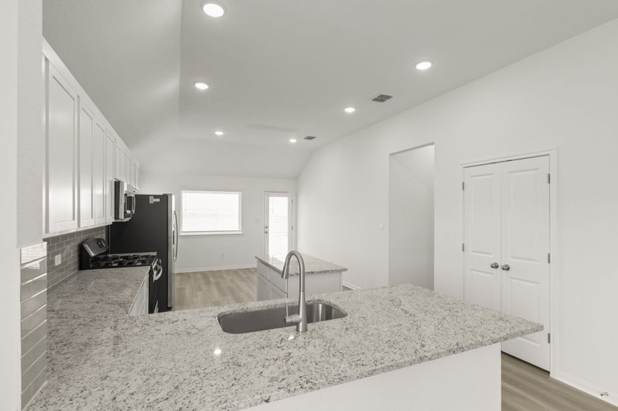 Furnished interior view inside a new home in Village at Three Oaks, Seguin (Image 11).