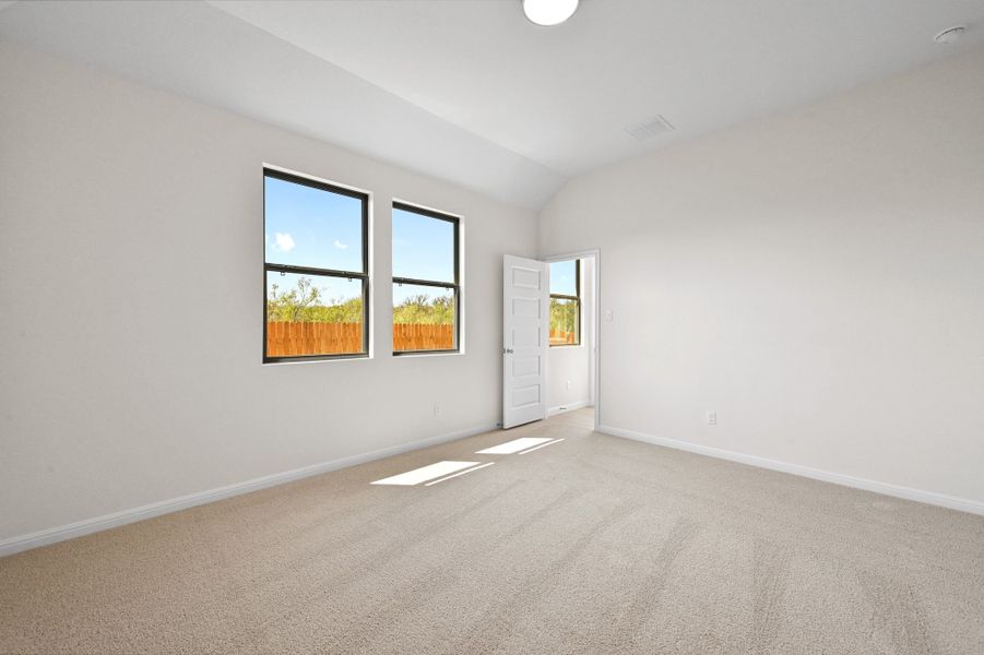 Primary Suite in the Cedar home plan by Trophy Signature Homes – REPRESENTATIVE PHOTO