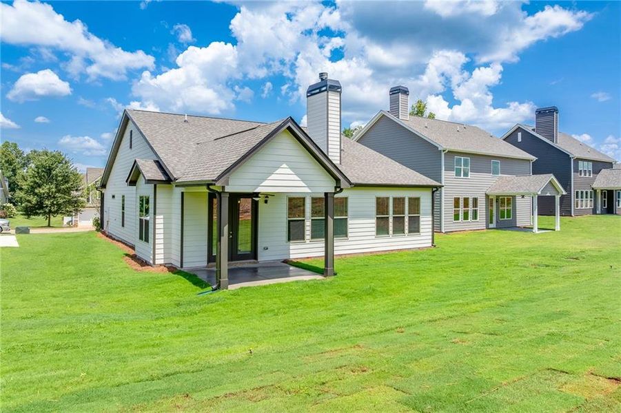 Exterior details and patio area of a home in , Homer (Image 19). Exterior details and patio area of a home in , Homer (Image 19).