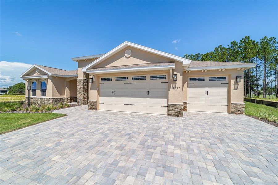 Front exterior of a new home in , Ocala, FL, highlighting curb appeal (Image 30).