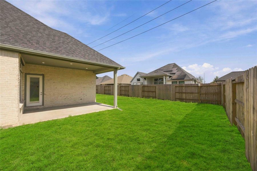 Exterior details and patio area of a home in Arabella on the Prairie, Richmond (Image 20).