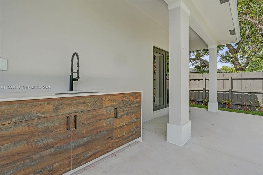 Exterior details and patio area of a home in , West Park (Image 30).