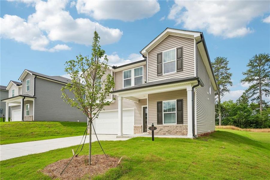 Front exterior of a new home in Manning Mill, Adairsville, GA, highlighting curb appeal (Image 2). Front exterior of a new home in Manning Mill, Adairsville, GA, highlighting curb appeal (Image 2).