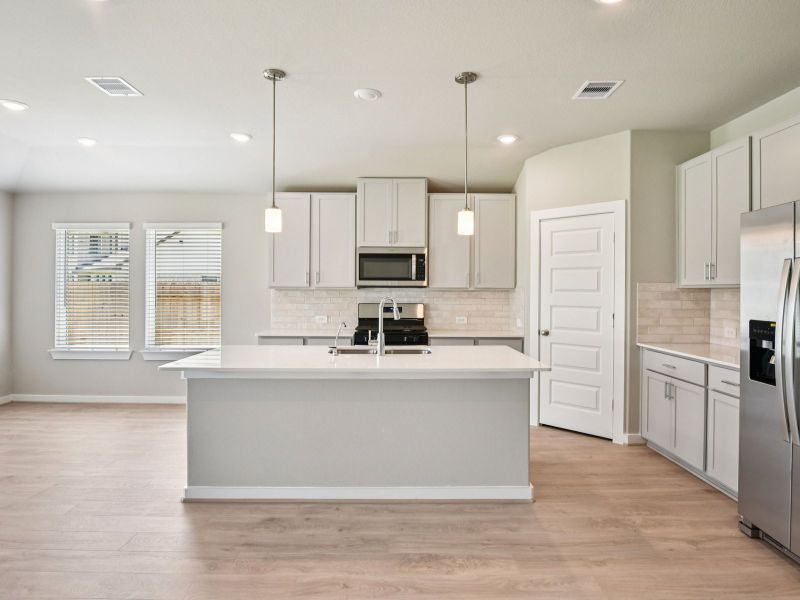 Furnished interior view inside a new home in Riviera Pines - Classic Series, Huffman (Image 4).