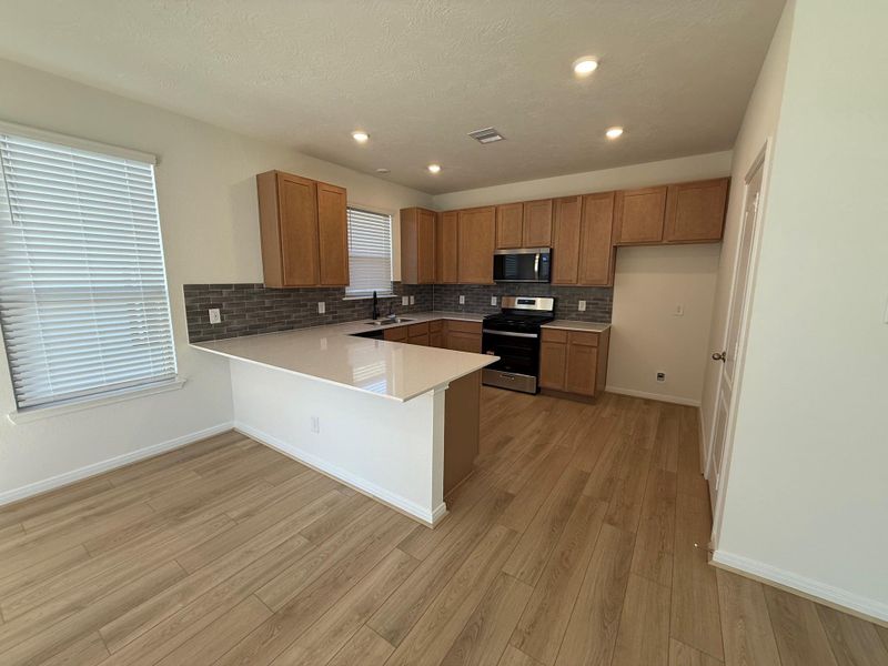 Furnished interior view inside a new home in Oakwood Trails, Tomball (Image 7). Furnished interior view inside a new home in Oakwood Trails, Tomball (Image 7).