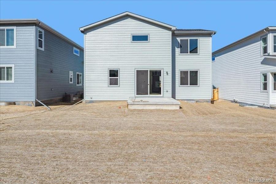 Exterior details and patio area of a home in Floret Collection at Alder Creek, Parker (Image 17).