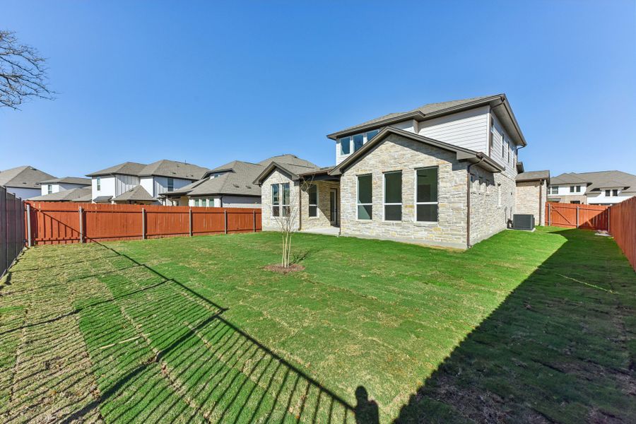 Exterior details and patio area of a home in Sauls Ranch, Round Rock (Image 17).