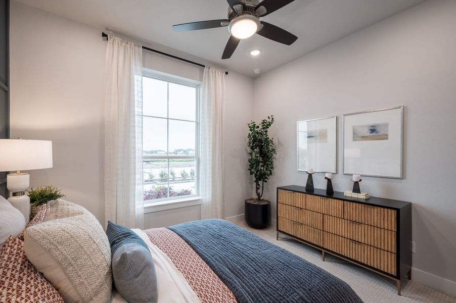 Representative furnished interior of a home built from the Falcon by Tri Pointe Homes in Tompkins Reserve, Katy (Image 11).