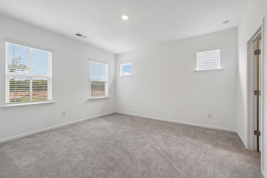 Spacious, unfurnished interior of a new home in Terraces at the Exchange, Indian Land (Image 13).