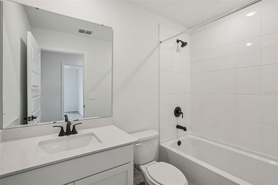 Furnished interior view inside a new home in Two Rivers - Signature Series, Zephyrhills (Image 10).