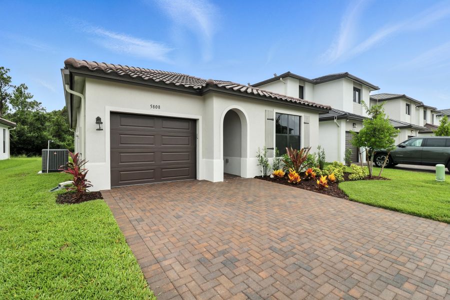 Front exterior of a home in the Maple Ridge community, located in Ave Maria, FL (Image 8). Front exterior of a home in the Maple Ridge community, located in Ave Maria, FL (Image 8).