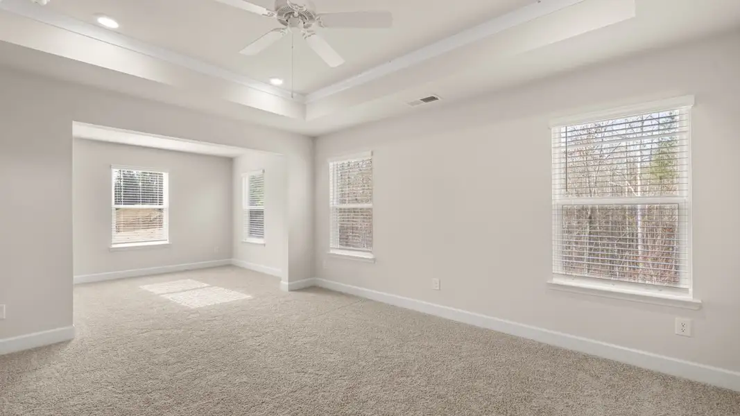 Representative unfurnished interior of a home built from the Hampshire by D.R. Horton in Heritage Pointe, Senoia (Image 30).
