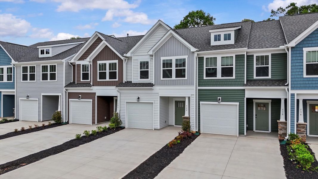 Two story townhome with stone column at Ransdell Pointe by DRB Homes in Spartanburg, SC