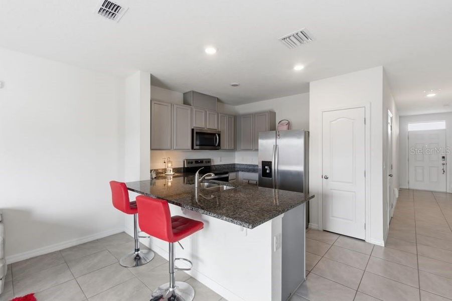 Furnished interior view inside a new home in Brentwood, Davenport (Image 6).