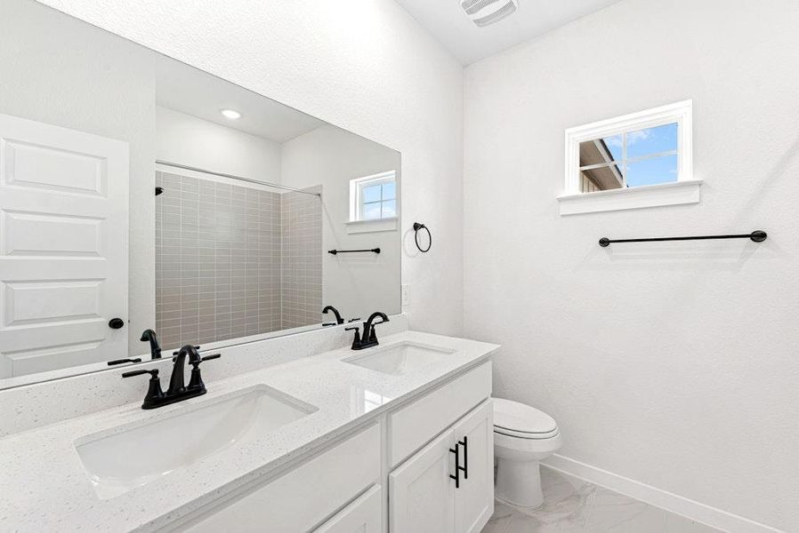 Furnished interior view inside a new home in University Heights, Round Rock (Image 9).