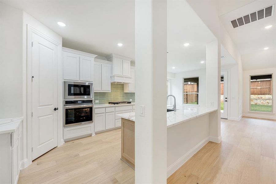 Furnished interior view inside a new home in Windsong Ranch Classic 61, Prosper (Image 6).