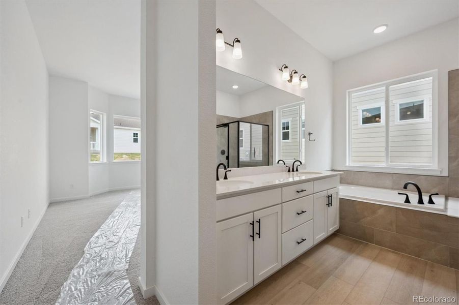 Furnished interior view inside a new home in The Aurora Highlands, Aurora (Image 5).