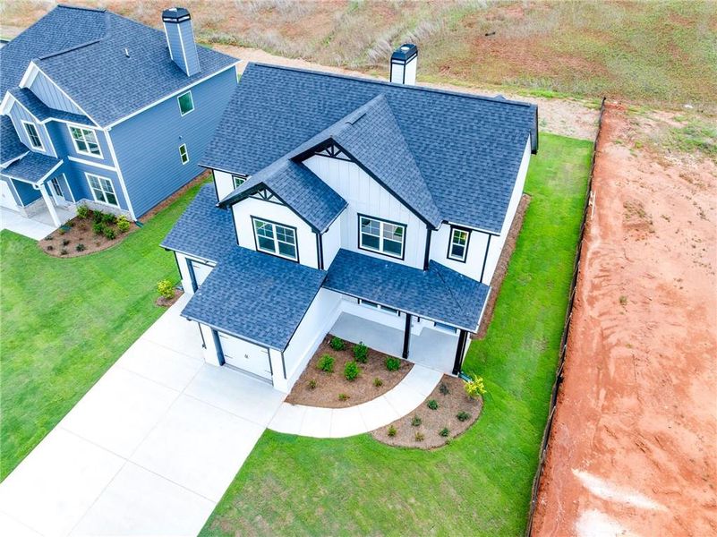 Front exterior of a new home in , Homer, GA, highlighting curb appeal (Image 18).