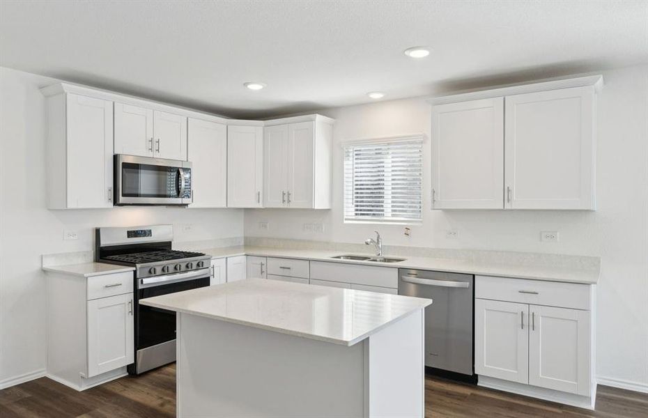 Spacious kitchen with eat-in bar top island Spacious kitchen with eat-in bar top island