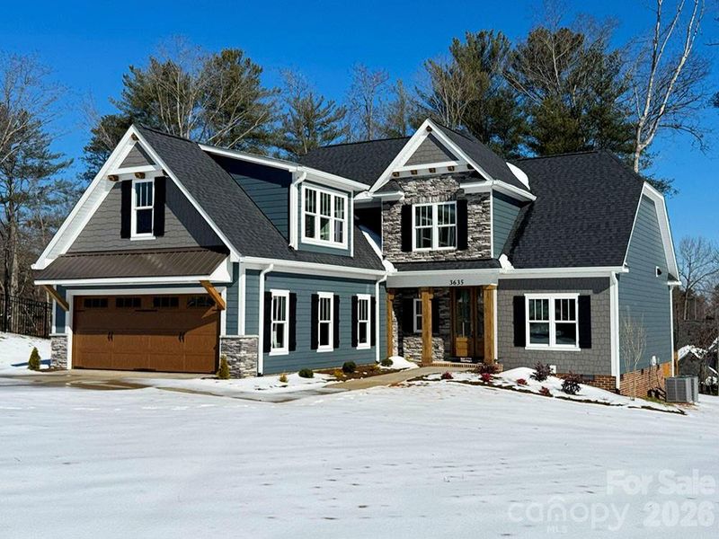 Front exterior of a new home in , Hickory, NC, highlighting curb appeal (Image 1). Front exterior of a new home in , Hickory, NC, highlighting curb appeal (Image 1).