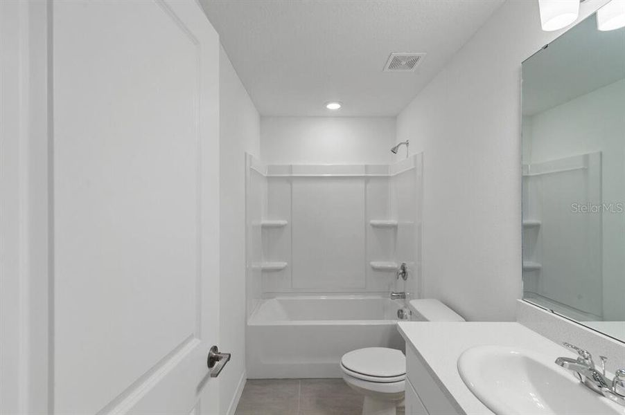 Furnished interior view inside a new home in Waterstone Townhomes, Groveland (Image 5).