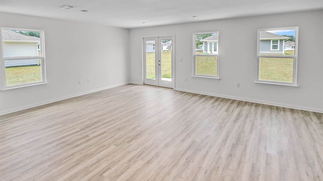 Representative unfurnished interior of a home built from the Lismore by D.R. Horton in Owl's Head Farms, Freeport (Image 12).