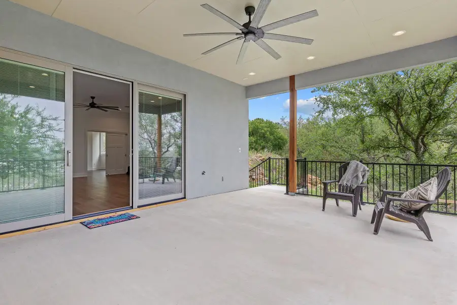 View of extended covered patio featuring ceiling fan. View of extended covered patio featuring ceiling fan.