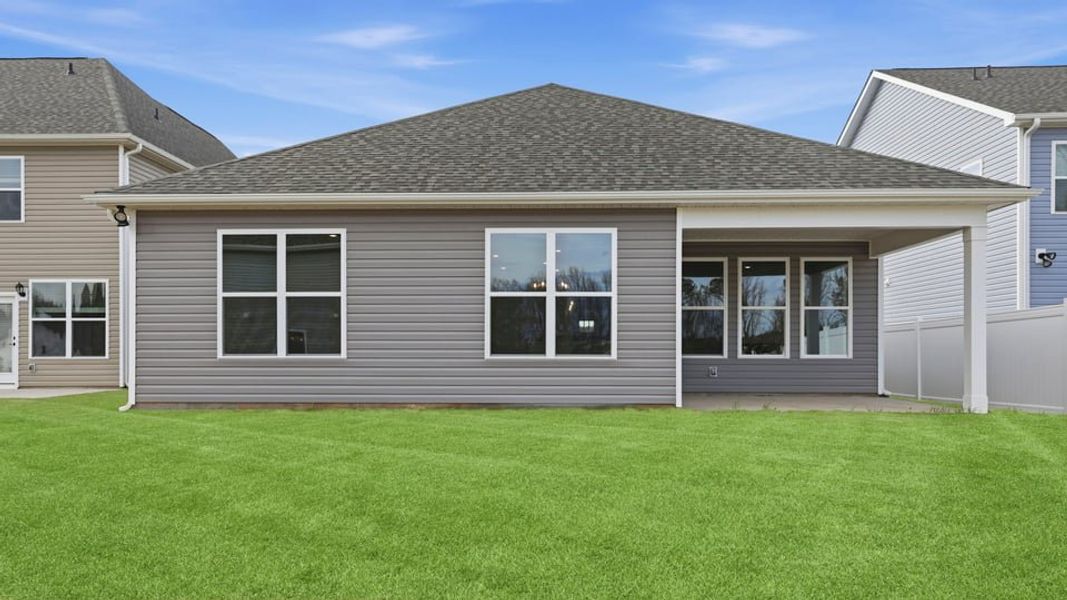 Exterior details and patio area of a home in Whitehawk Meadows, Travelers Rest (Image 3).