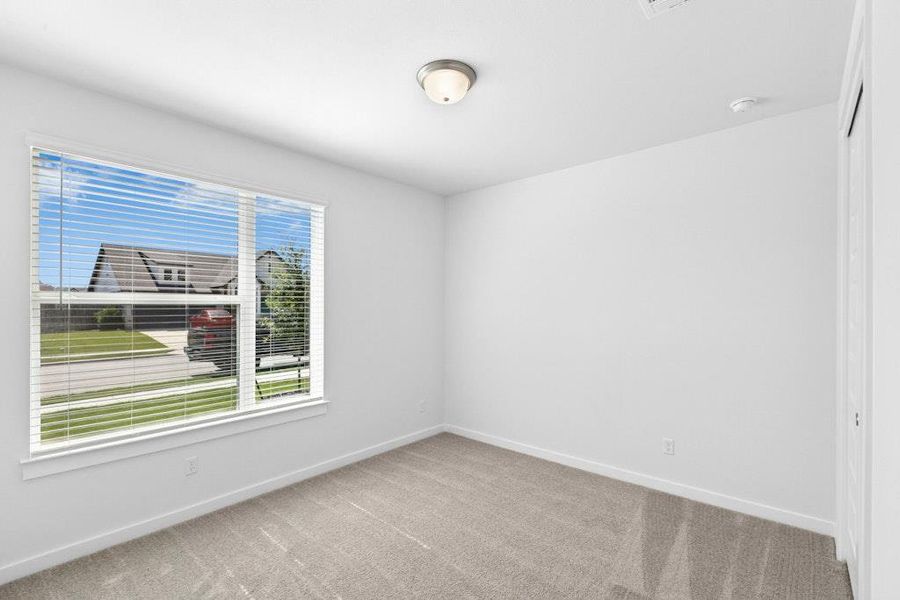 Spacious, unfurnished interior of a new home in The Colony, Bastrop (Image 14).