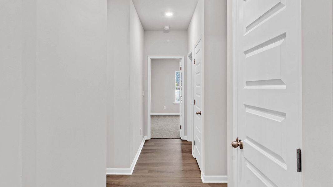 Representative unfurnished interior of a home built from the Fraser by D.R. Horton in Riverwood Gardens, Oakland (Image 20).