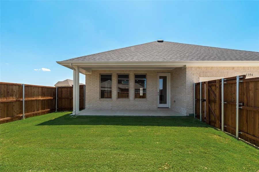 Front exterior of a new home in Villages of Creekwood, Frisco, TX, highlighting curb appeal (Image 16). Front exterior of a new home in Villages of Creekwood, Frisco, TX, highlighting curb appeal (Image 16).