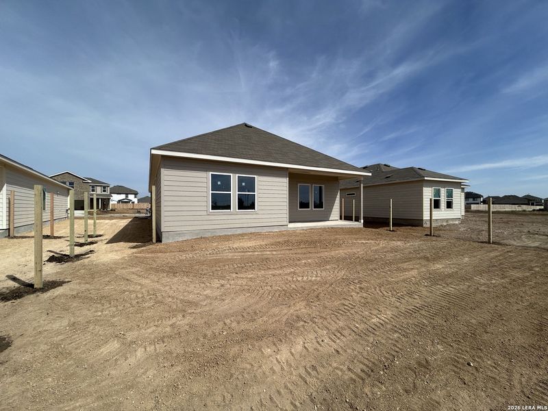 Exterior details and patio area of a home in Hennersby Hollow, San Antonio (Image 12).