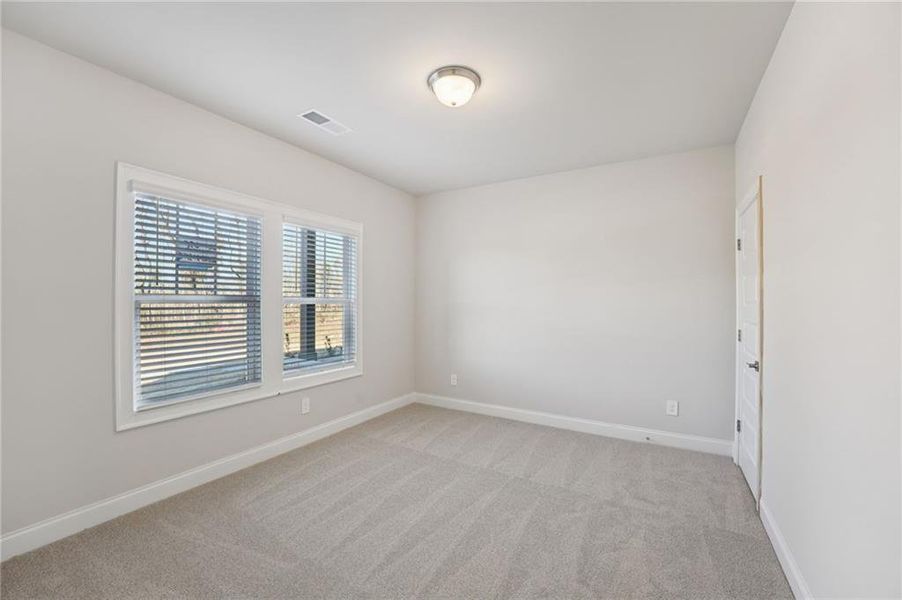Spacious, unfurnished interior of a new home in Hemingway - Highland Series, Cumming (Image 43).
