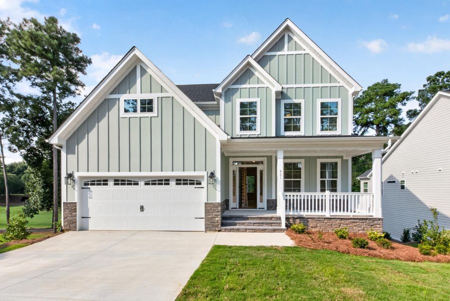 Front exterior of a new home in True Cedar at Woodside Plantation, Aiken, SC, highlighting curb appeal (Image 1). Front exterior of a new home in True Cedar at Woodside Plantation, Aiken, SC, highlighting curb appeal (Image 1).
