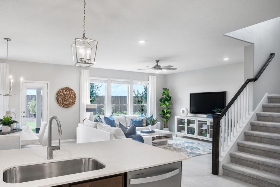 Representative furnished interior of a home built from the Plan 2458 Modeled by KB Home in Stoney Chase, Del Valle (Image 5).