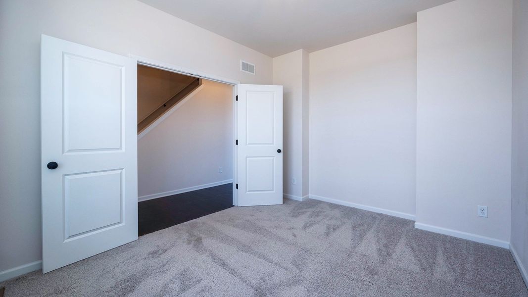 Representative unfurnished interior of a home built from the The Kettering by Norfolk Homes in Preserve at Magnolia Park, Jackson (Image 27).
